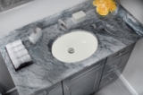 Undermount 19-1/4 in. Glazed Porcelain Oval Bathroom Sink in Biscuit